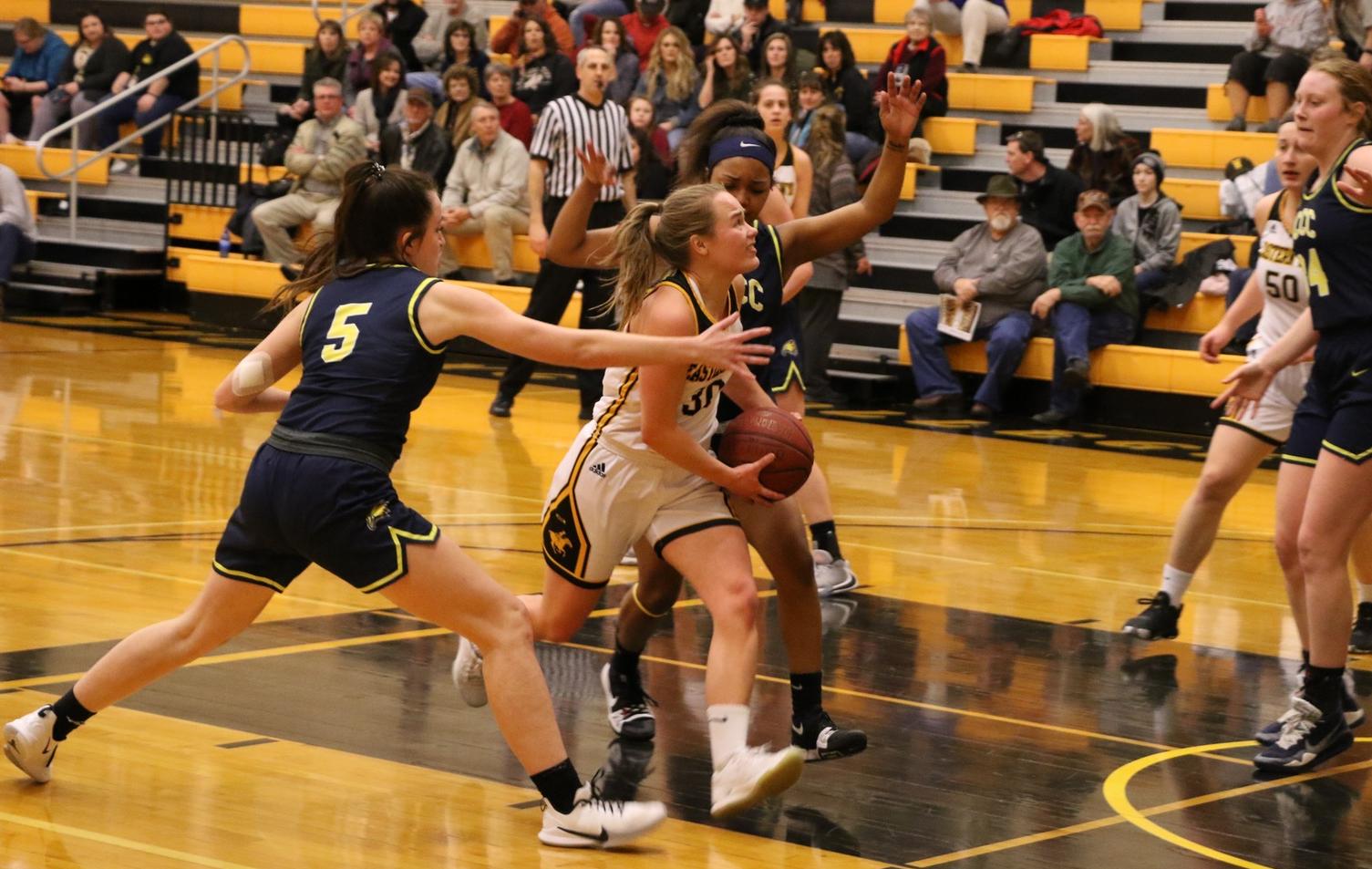 EWC freshman Emma Strom drives through the lane during the first half of the Lancers' home win against Laramie County on Wednesday night.